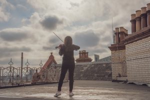 Violinist Rakhi Singh, photographed on the roof of The Midland Hotel, Manchester.